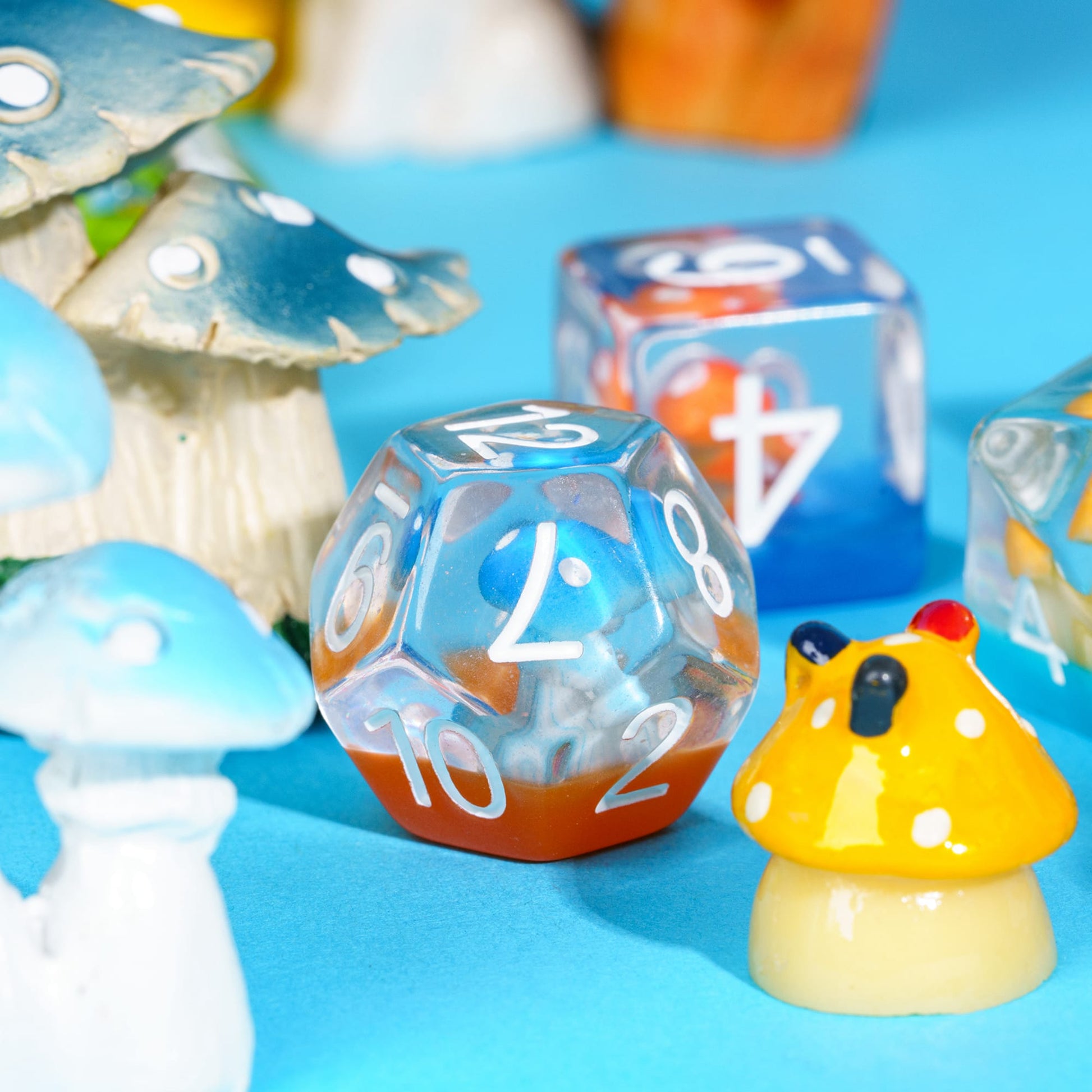 Close up Transparent Feyshroom resin dice, multicolor mushroom design polyhedral dice for RPG