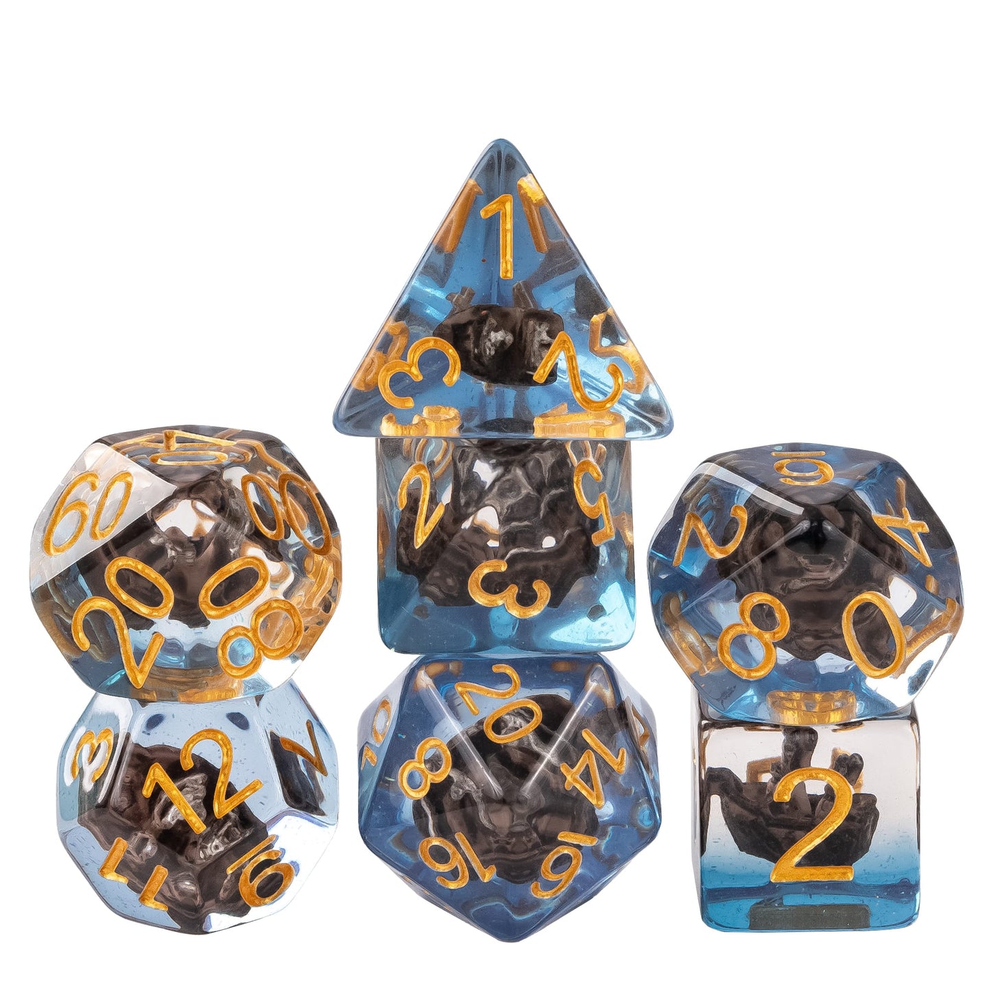 Transparent sail boat dice set with miniature black ship inclusions in blue resin and gold numbering