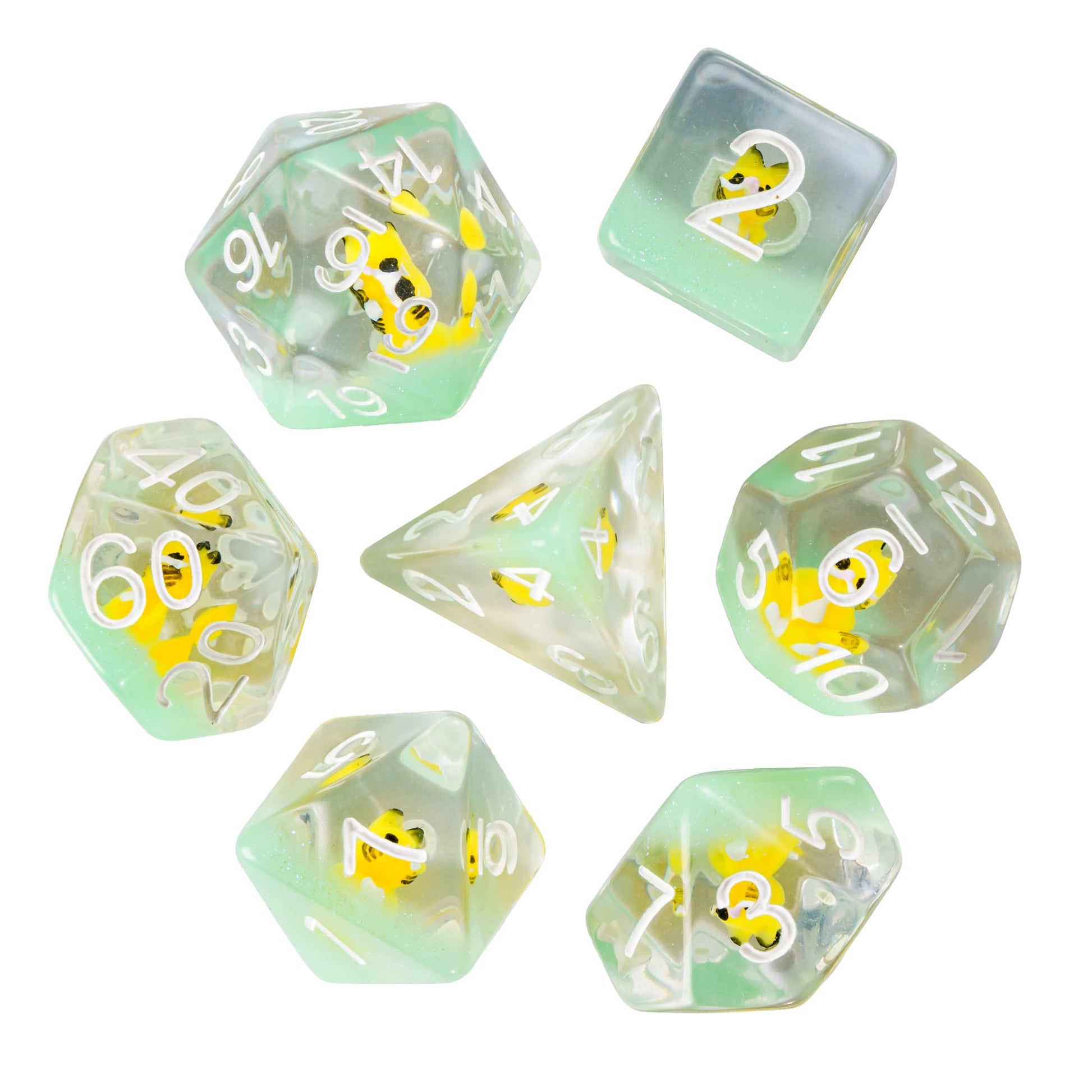 Flat lay of Transparent Yellow Cat Dice Set with seven resin dice and embedded cat miniatures.