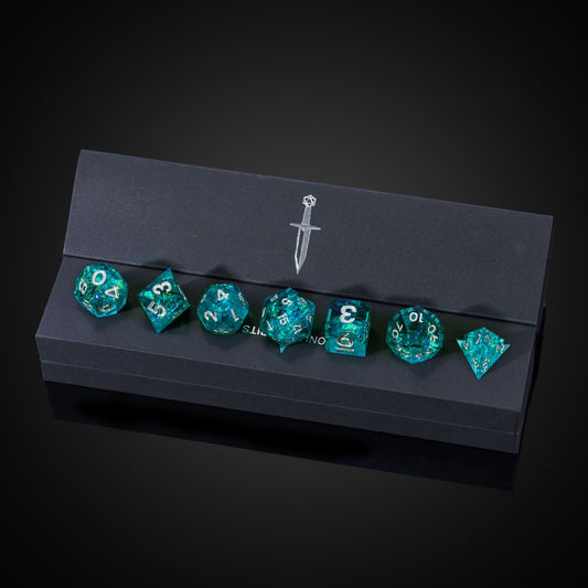 Turquoise Soul sharp edge dice set in black Only Crits display box with logo and turquoise foil