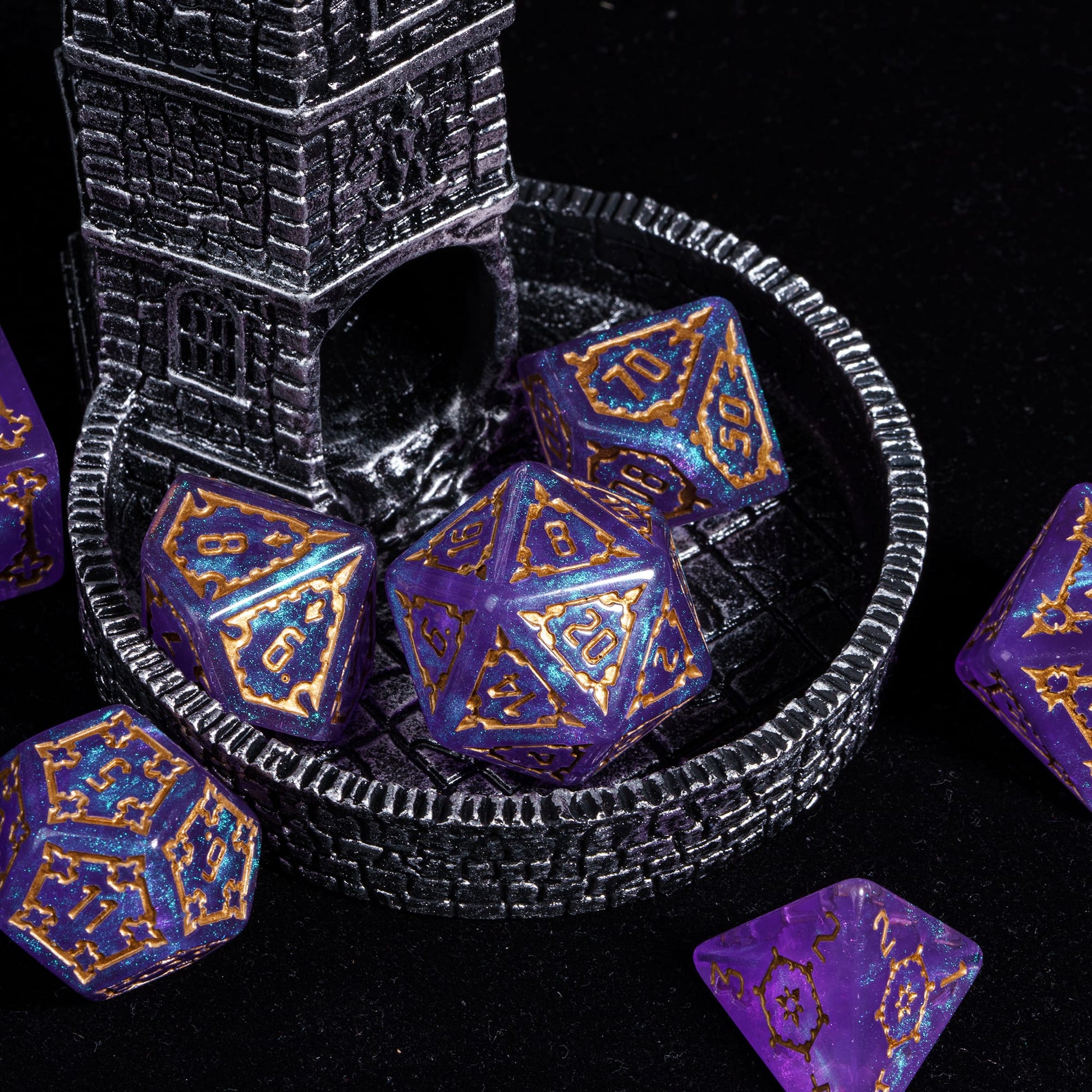 Violet Elixir Chonk Dice Set displayed in castle terrain for fantasy tabletop adventures
