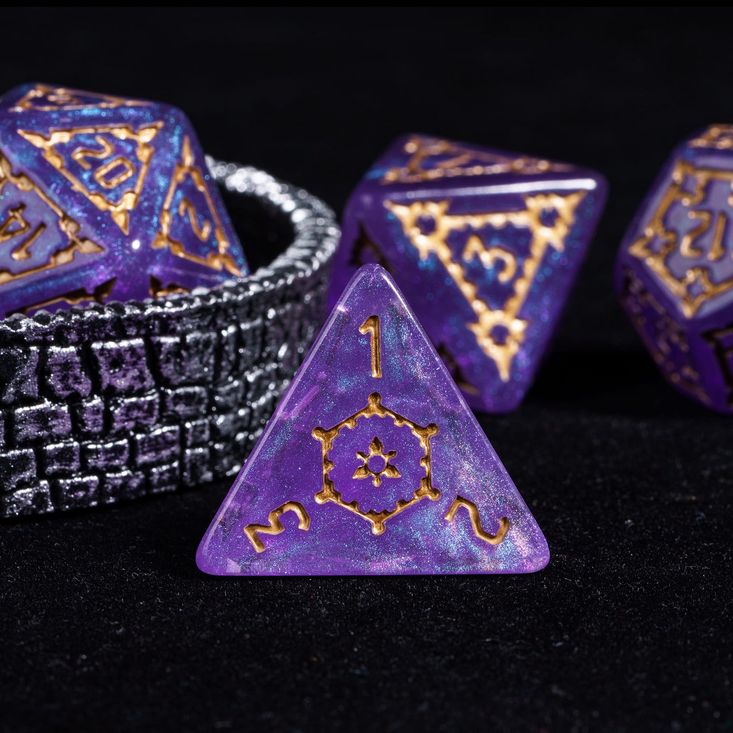 Close up of Violet Elixir Chonk D4 with shimmering purple finish and gold details