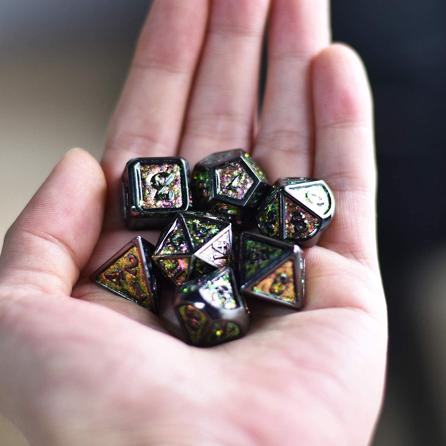 Viridian Shimmer 7 piece dice set sitting in hand
