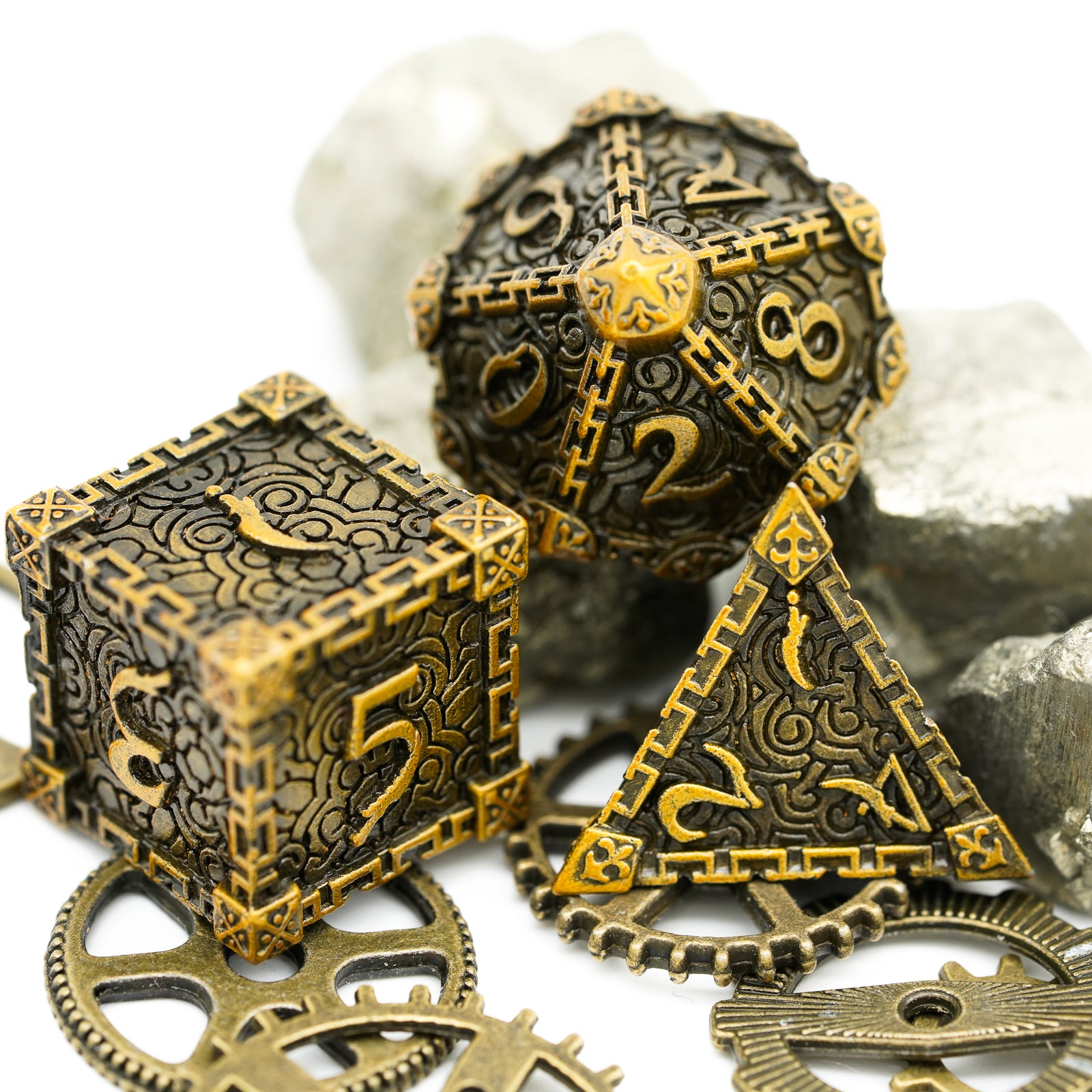 metal dice, gold edges and numbers with dark backing