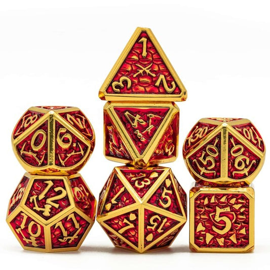 Red metal 7 piece dice set with gold numbers and trim
