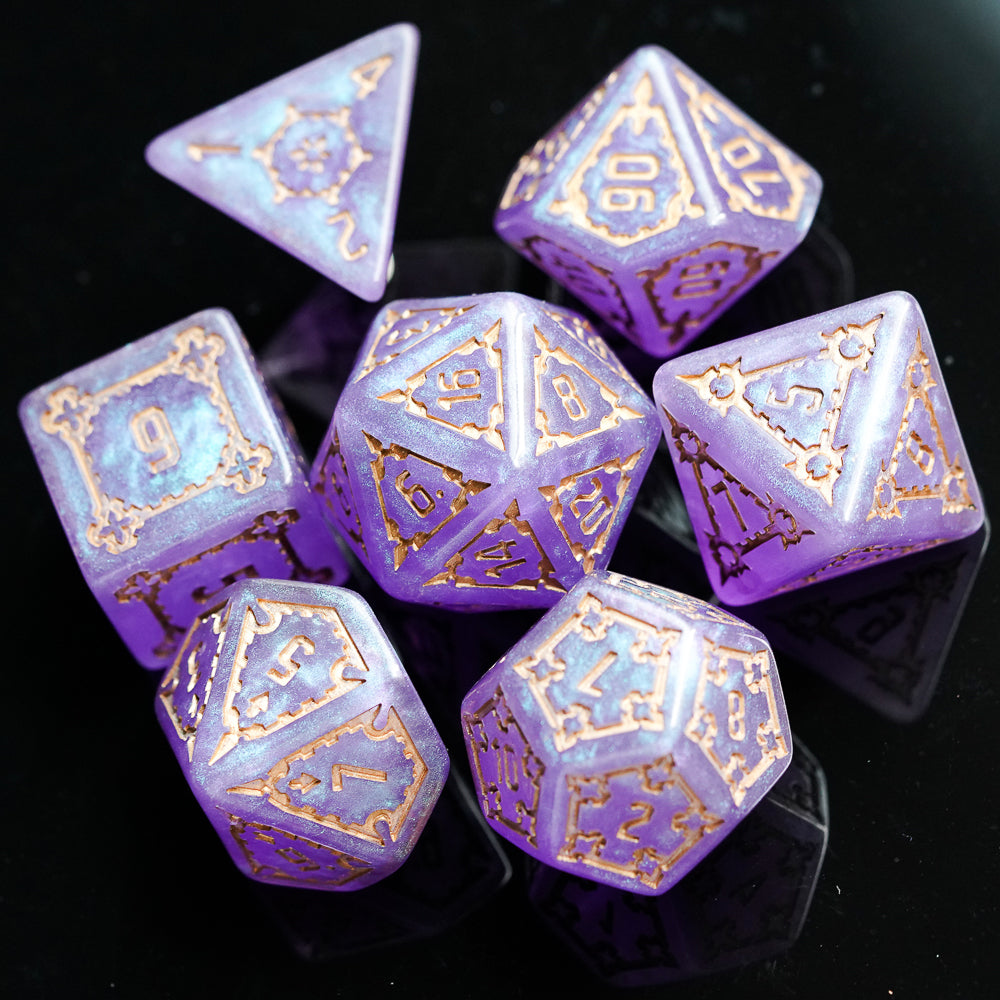 violet elixir dice set on black background