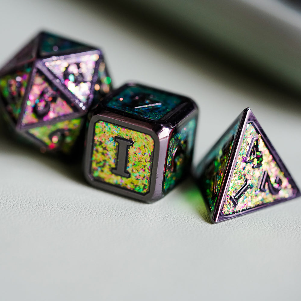 d20, d6 and d4 metal dice sitting on white leather