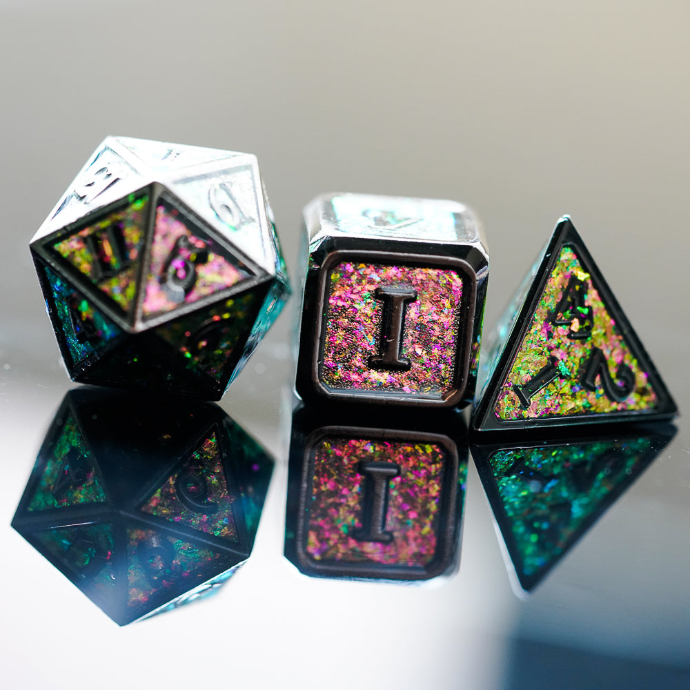d20, d6 and d4 sparkling pink and green with reflective dark background