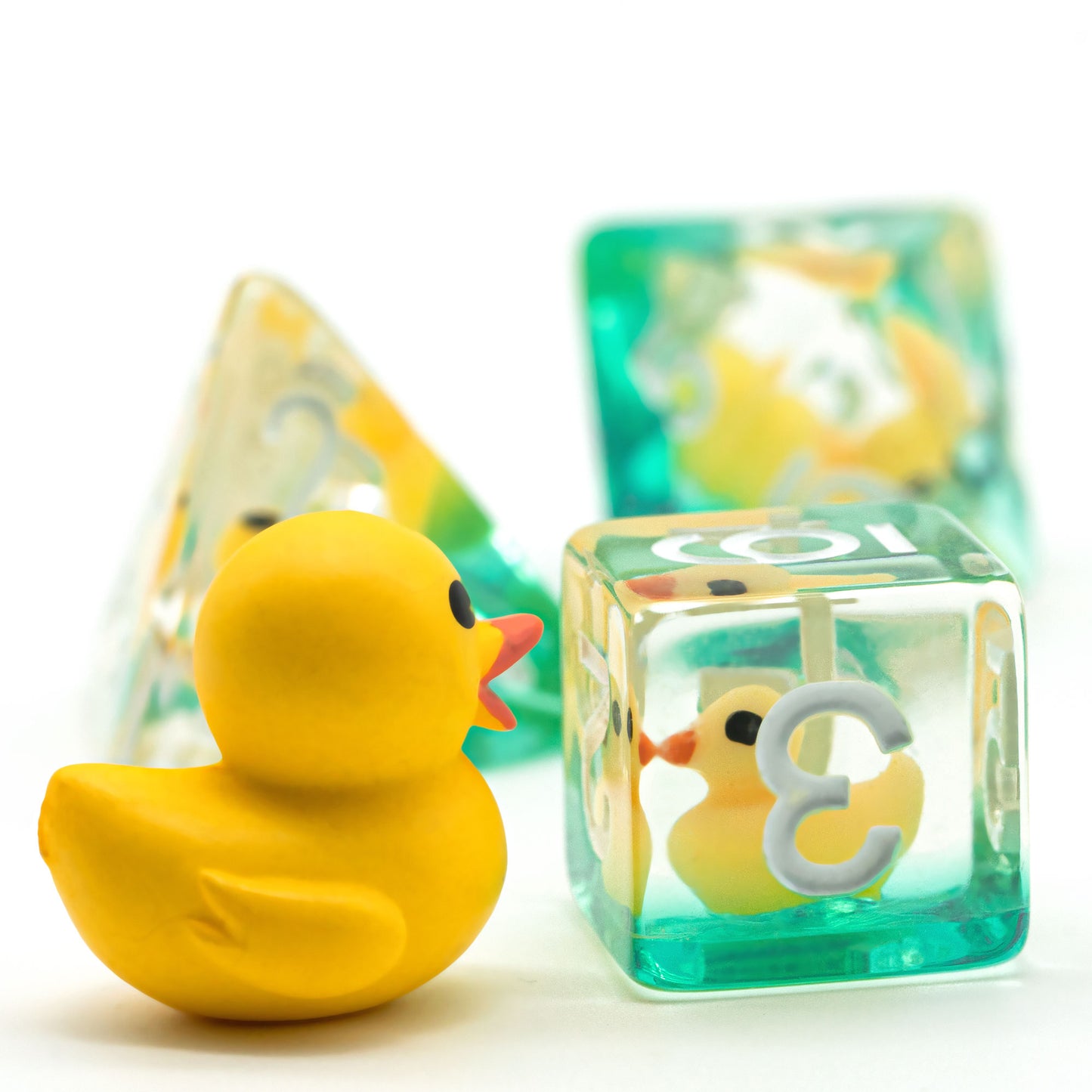 Rubber ducky staring at counterpart in d6