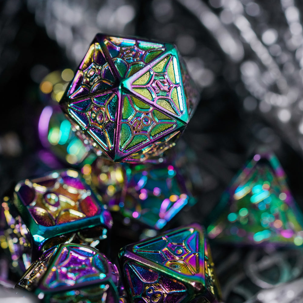 Multicolored d20 with other dice blurry in the backgound