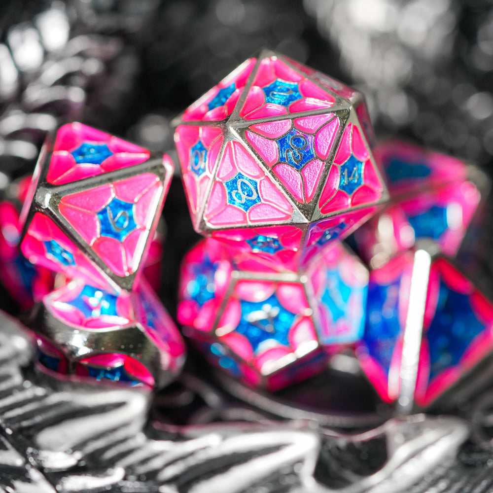 pink and blue metal d20 and d8