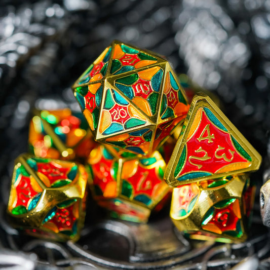 Multicolored metal dice set, d20 and d4 in front with rest of the set blurry in the background