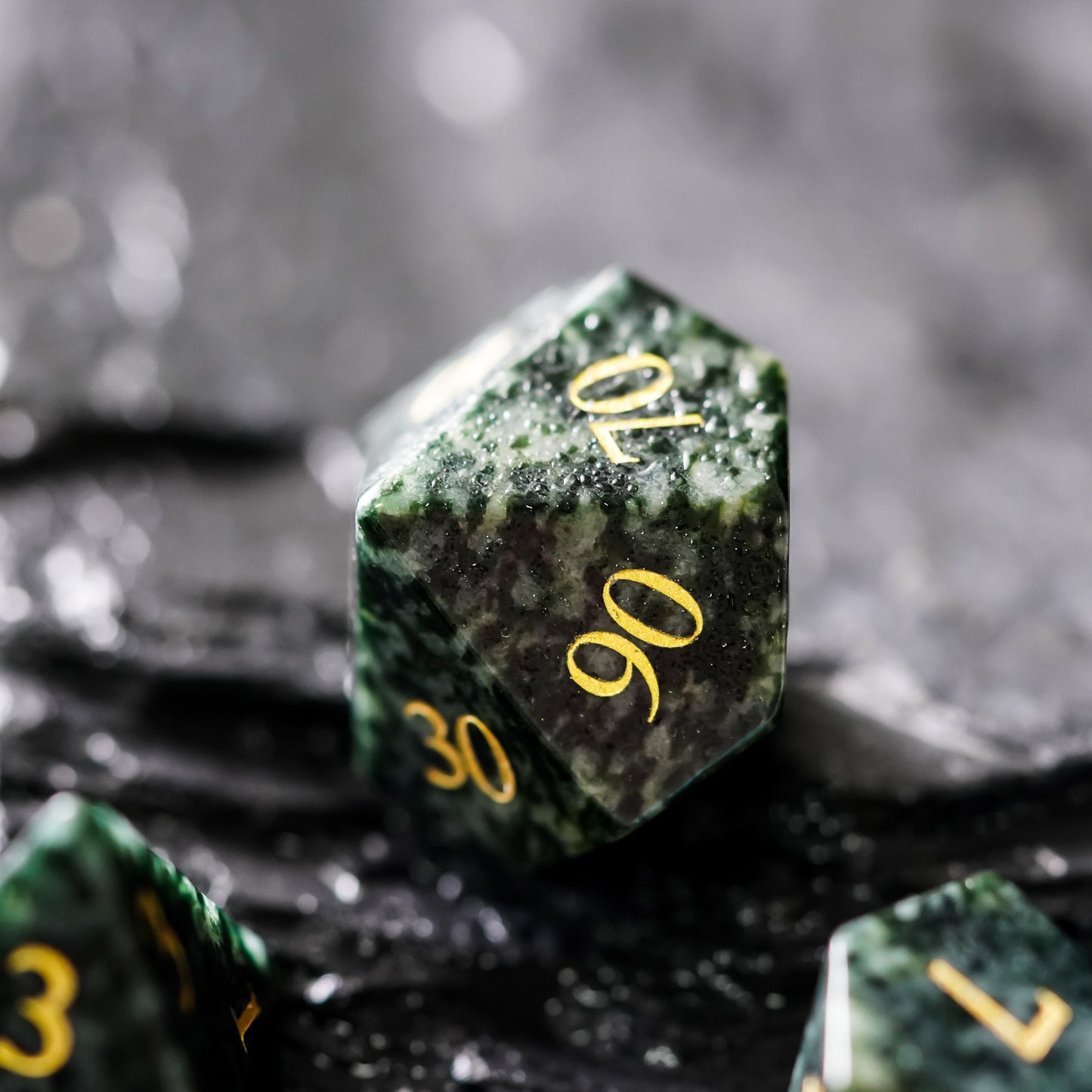 seaweed tangle percentage dice, dark green and black with gold numbers