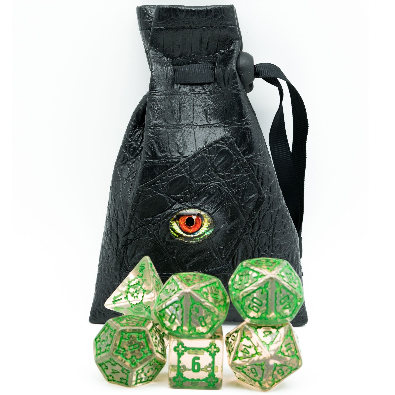 mossy elixir clear and green dice set in front of dragon eye carrying bag