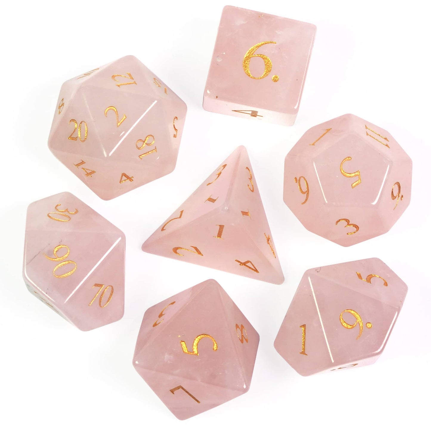 light pink colored stone dice set