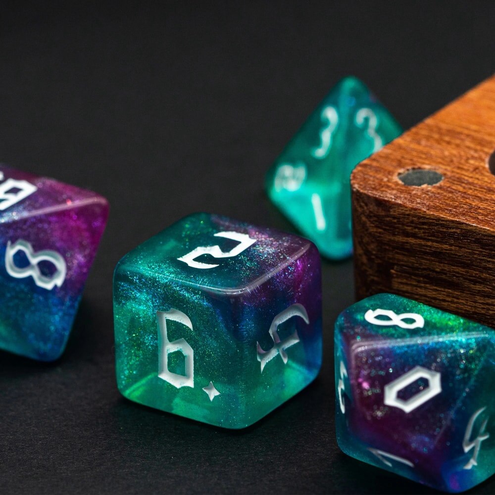 Multicolored dnd dice set on dark background