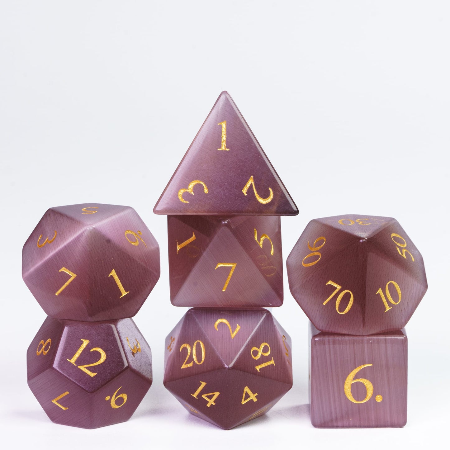 Purple dice with gold numbers