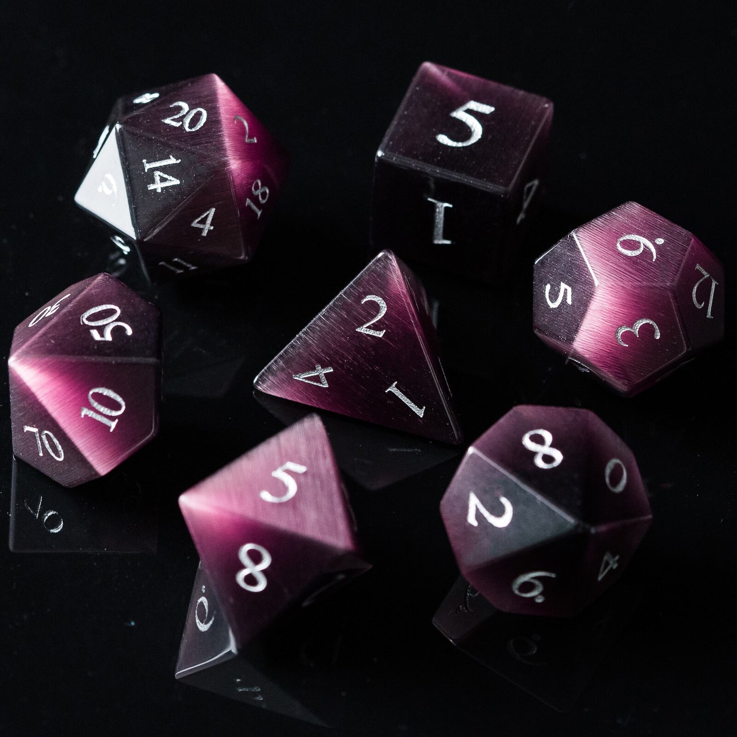 Dnd stone dice set on black background