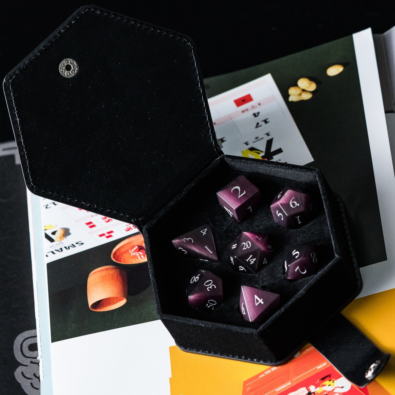 Stone dice set in complementary black case