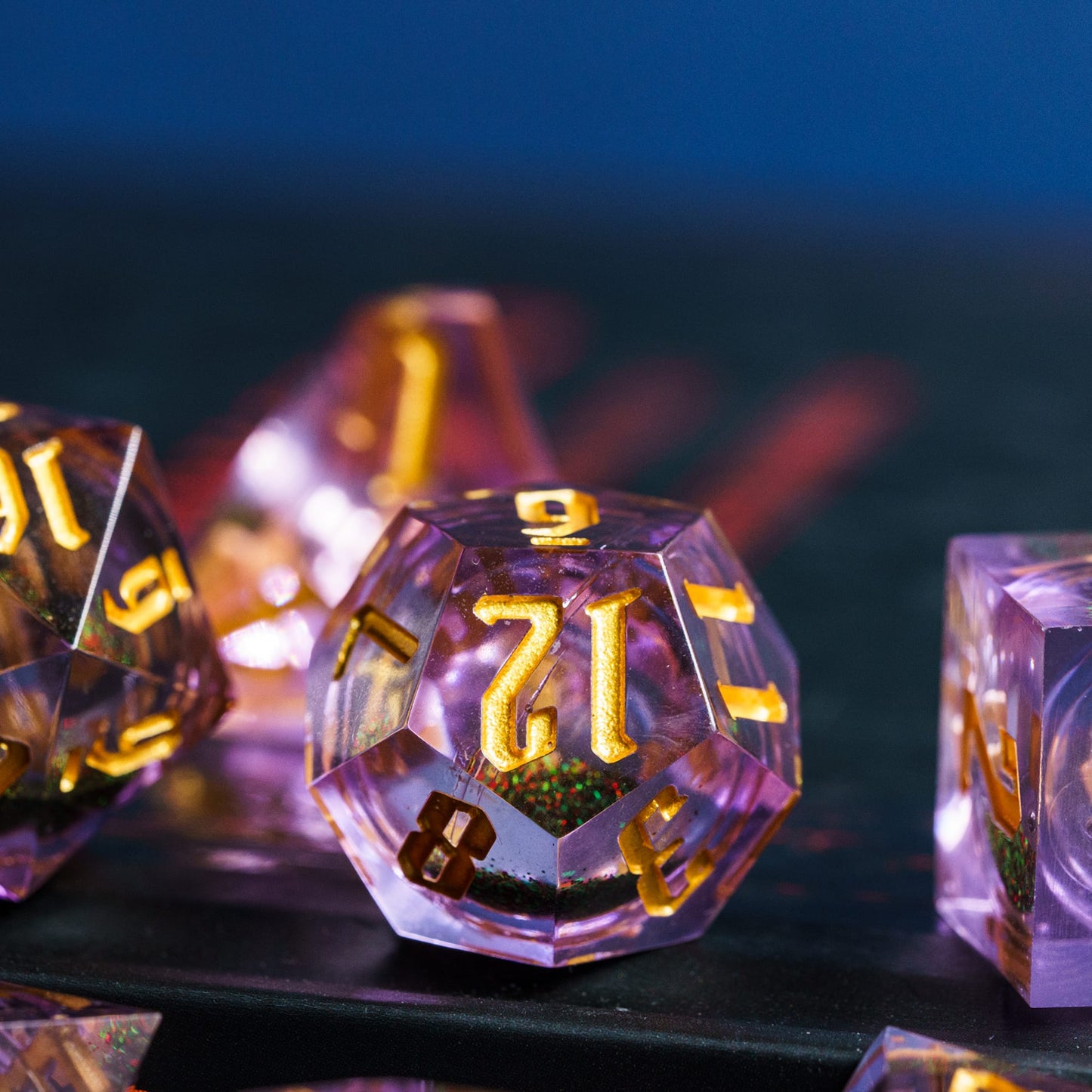 Up close feature of purple d12 from quicksand dice set