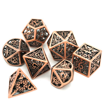 Bronze snowflake-themed hollow dice laid flat on white background for DND RPG D&D 5e