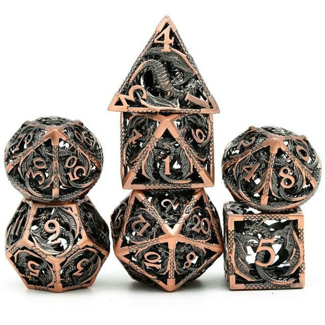Full set of Ancient Copper Dragon hollow metal dice with intricate dragon carvings