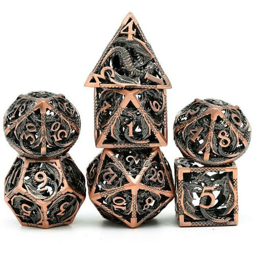 Full set of Ancient Copper Dragon hollow metal dice with intricate dragon carvings