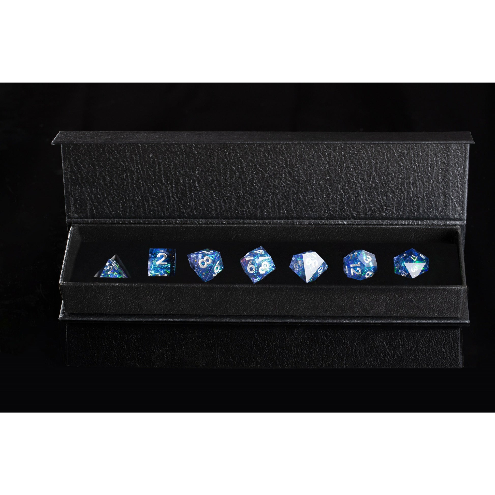 Blue dice set in black leather dice box