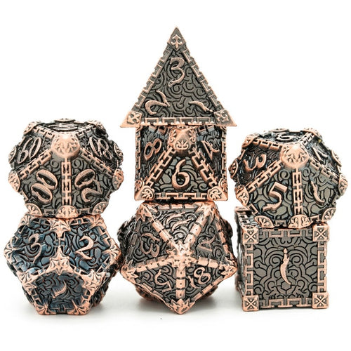Bronze Blade metal dagger dice set stacked for display, bronze engraved design for DnD and tabletop RPG