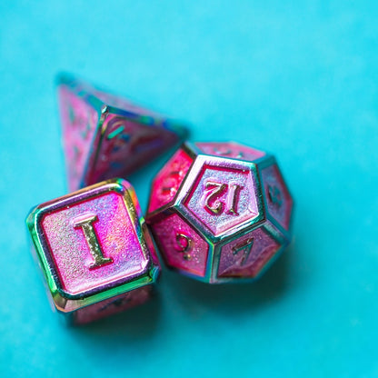 Coral Illusion Metal Dice Set showing d6, d12 and d4 highlight on a blue background