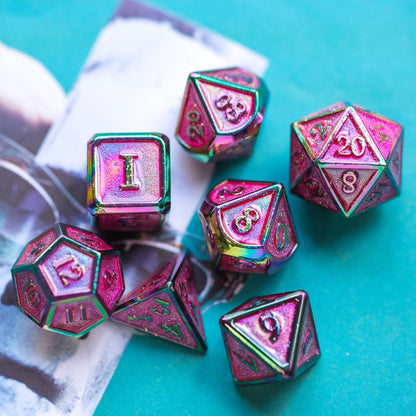 Full Coral Illusion Metal Dice Set with pink shimmer and rainbow metal edges