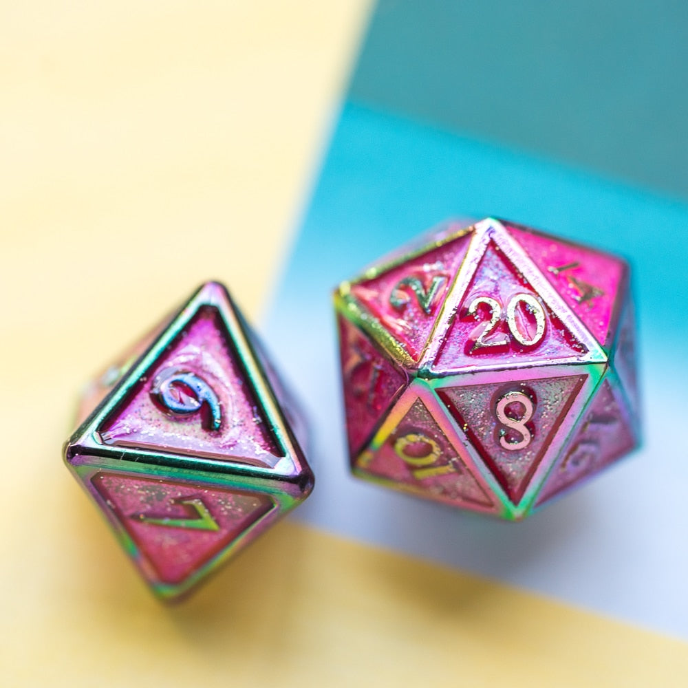 Coral Illusion Metal D20 and D4 dice on blue background