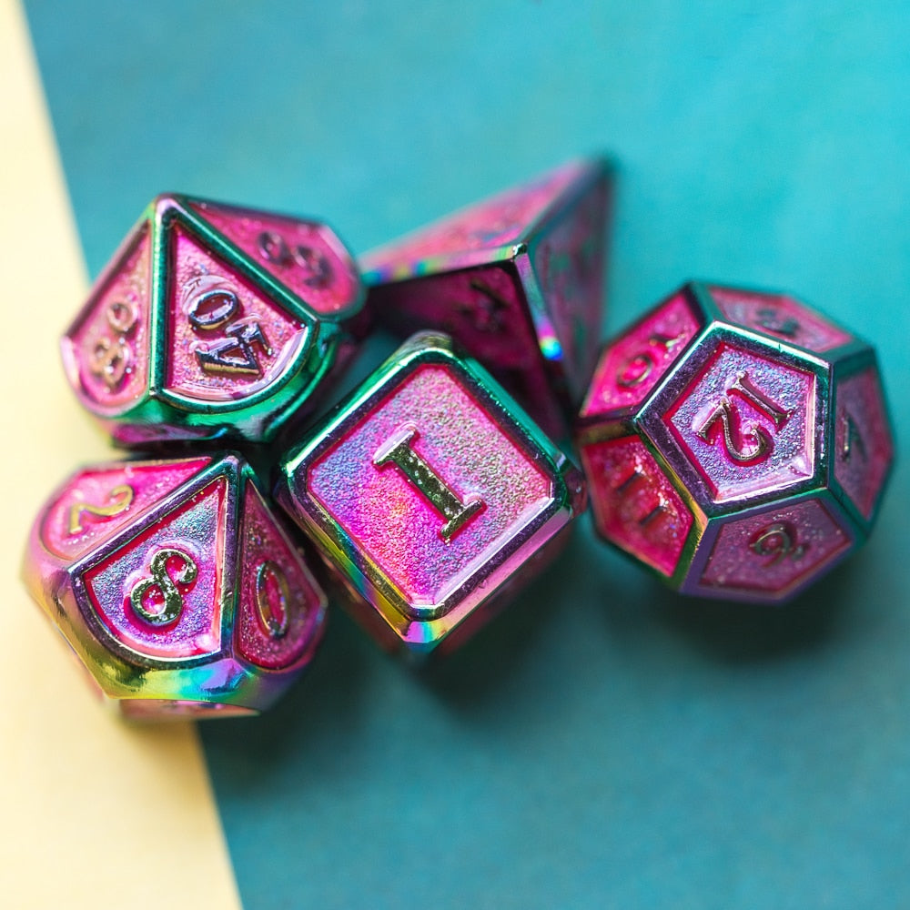 Group of Coral Illusion Metal Dice with iridescent pink sparkle