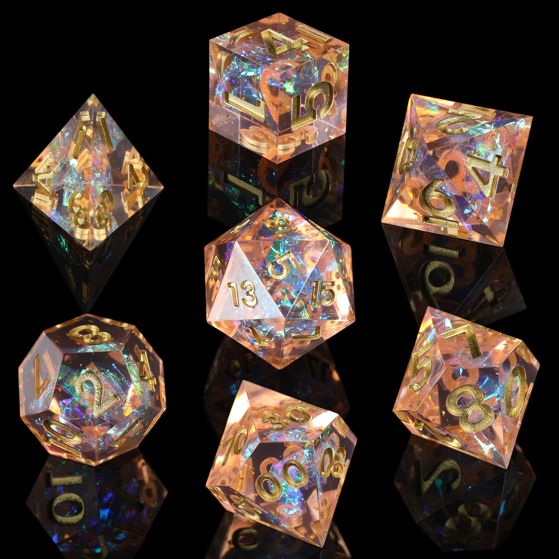 7 piece peachy fragments dice set, golden blue with sparkle numbers.
