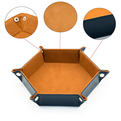 Close-up detail of Hexagon Core orange suede fabric and stitching on the dice tray