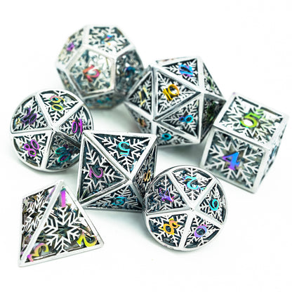 Hollow silver dice with rainbow numbers laid out on white for DND RPG and D&D 5e play