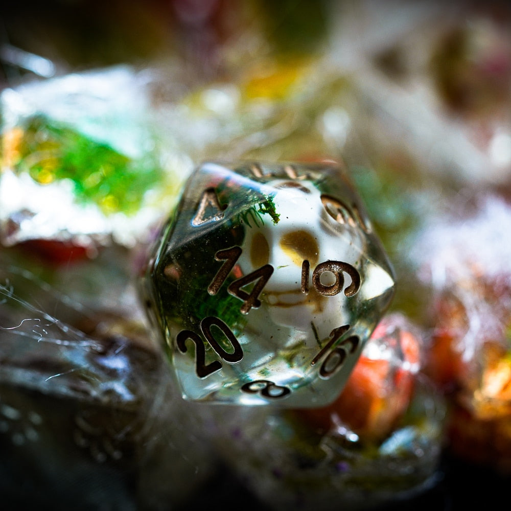 d20 highlight, white skull with moss inside die