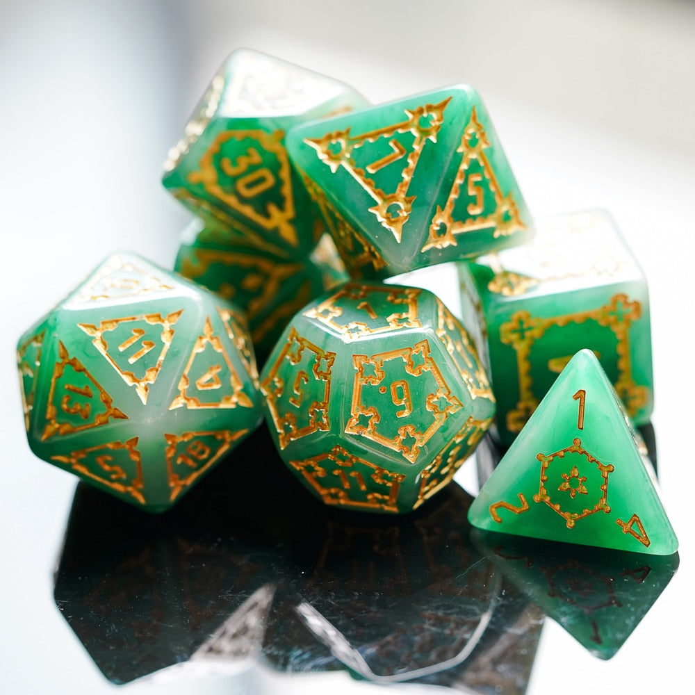Green and gold seven peice dnd dice set