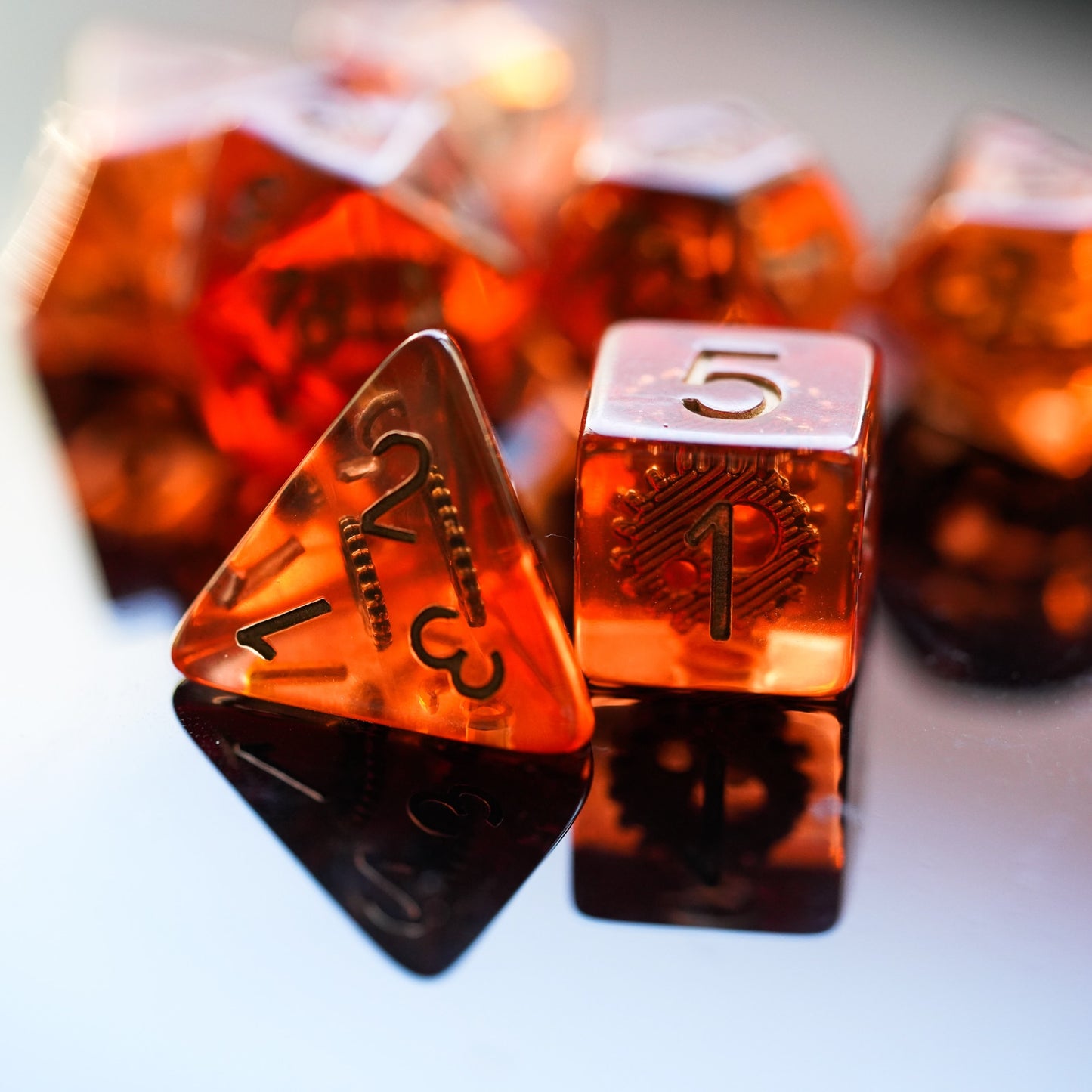 Red orange d4 and d6 highlight gears dice set