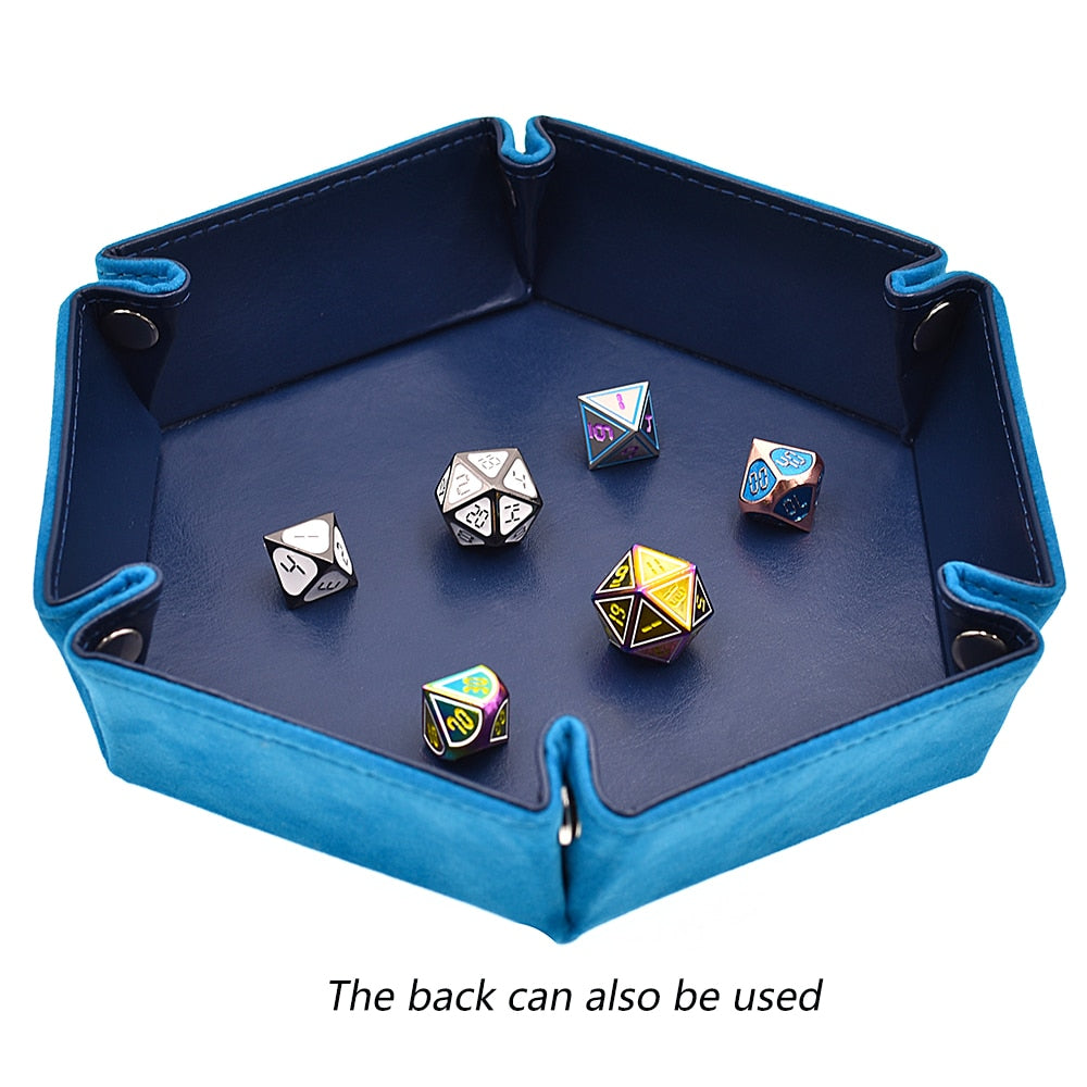 Blue tray turned inside out with dice inside, text beneath reads "The back can also be used"