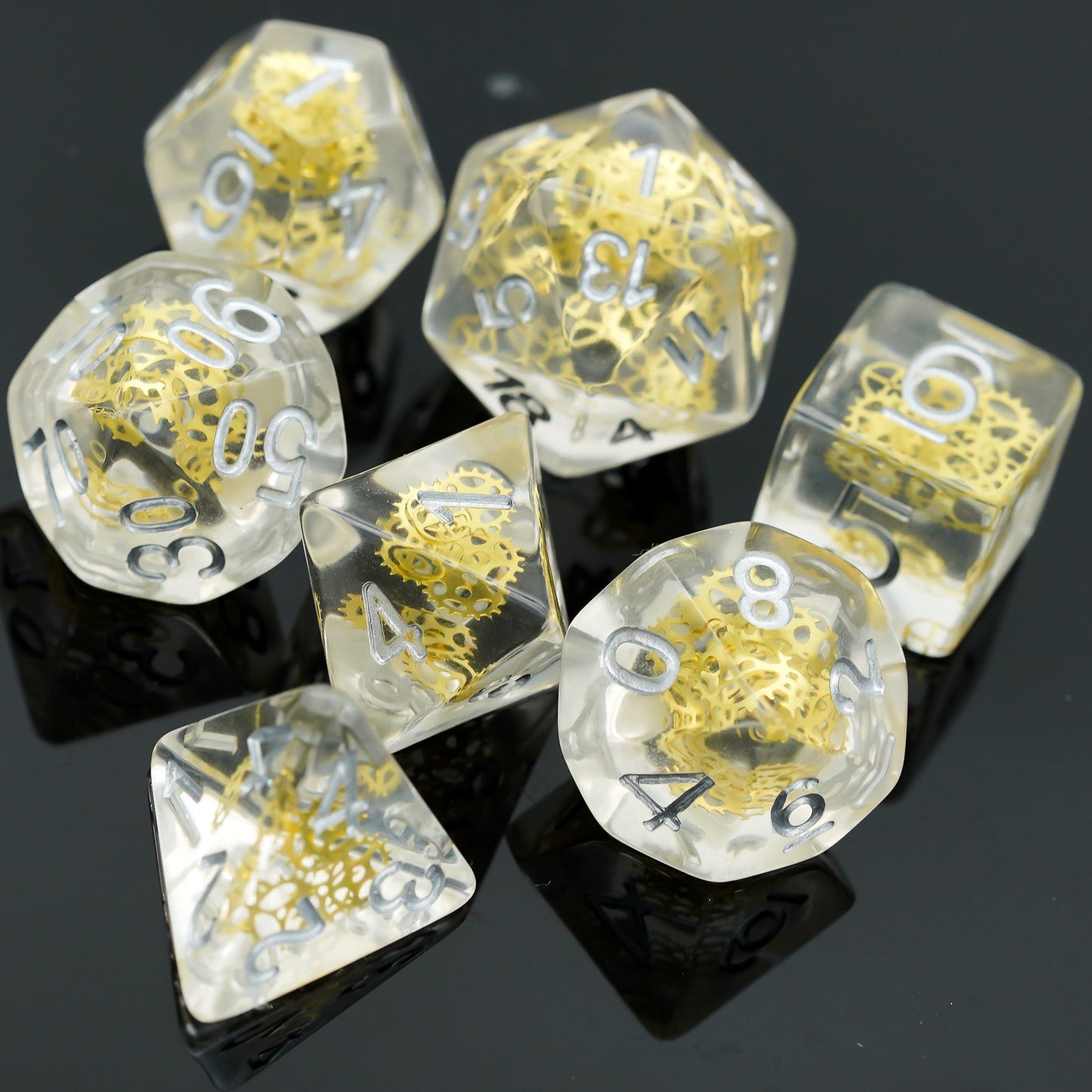 Clear resin with white numbers, gears inside, 7 piece dice set