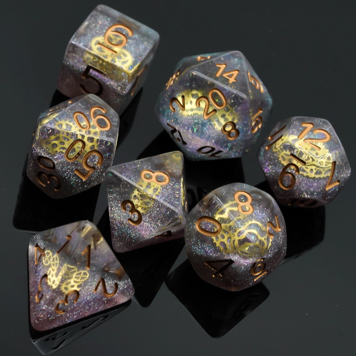 Gold numbers and gears, 7 piece dice set with star-like resin 