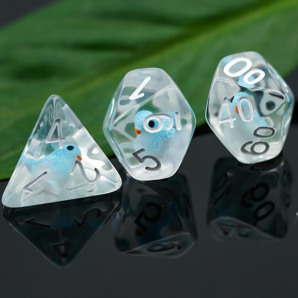 d4, d10 and percentage dice with leaf in background