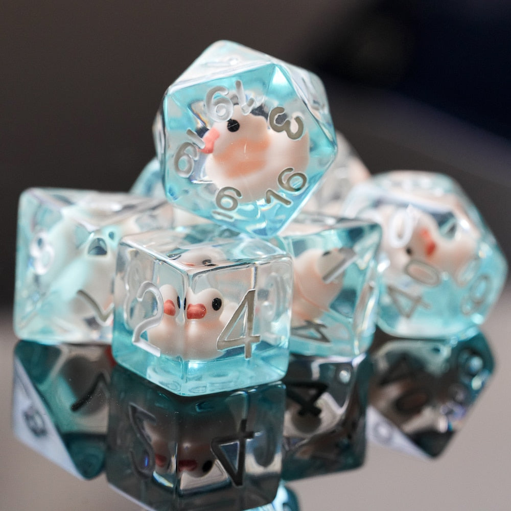 Transparent d20 ducky die stacked on top of other ducky dice