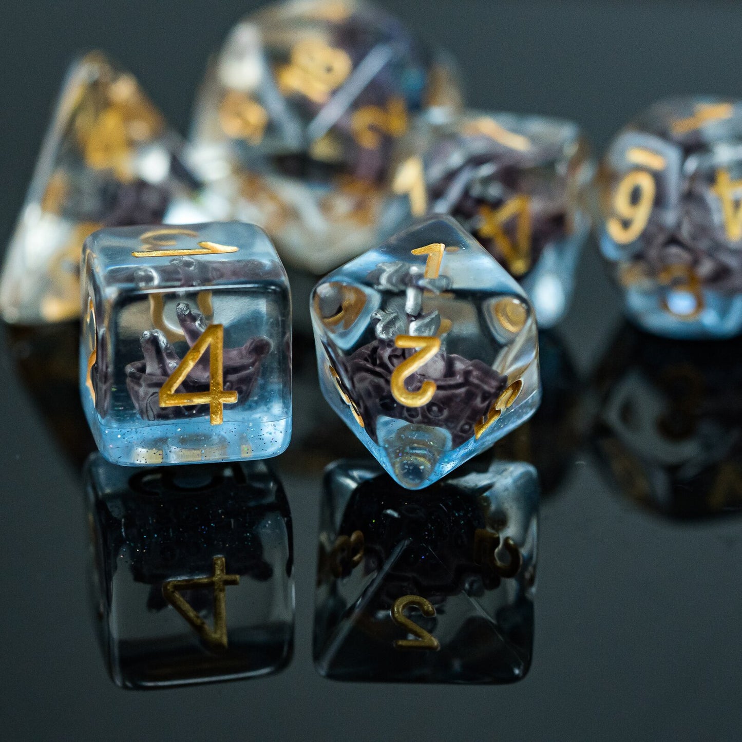 d8 and d6 highlight, sailboat dice with rest of set in background