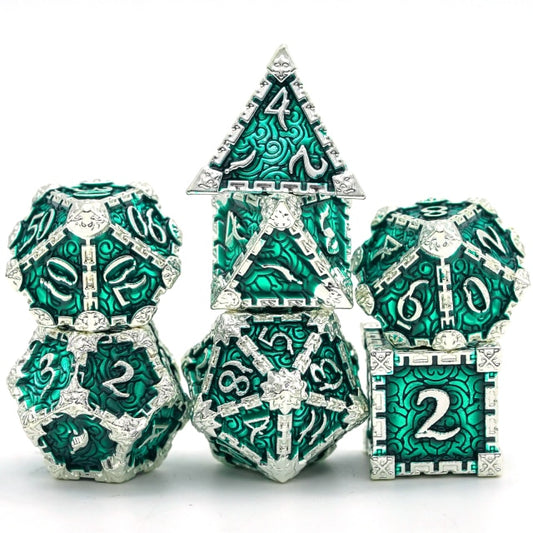 7 piece metal dice set, green with silver filigree and numbers