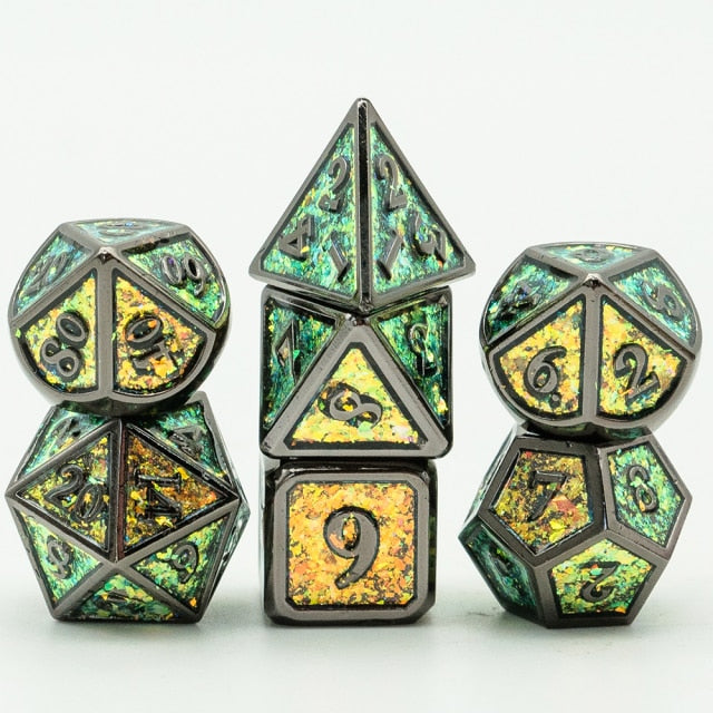 7 piece mossy shimmer metal dice set, green and yellow with dark trim and numbers